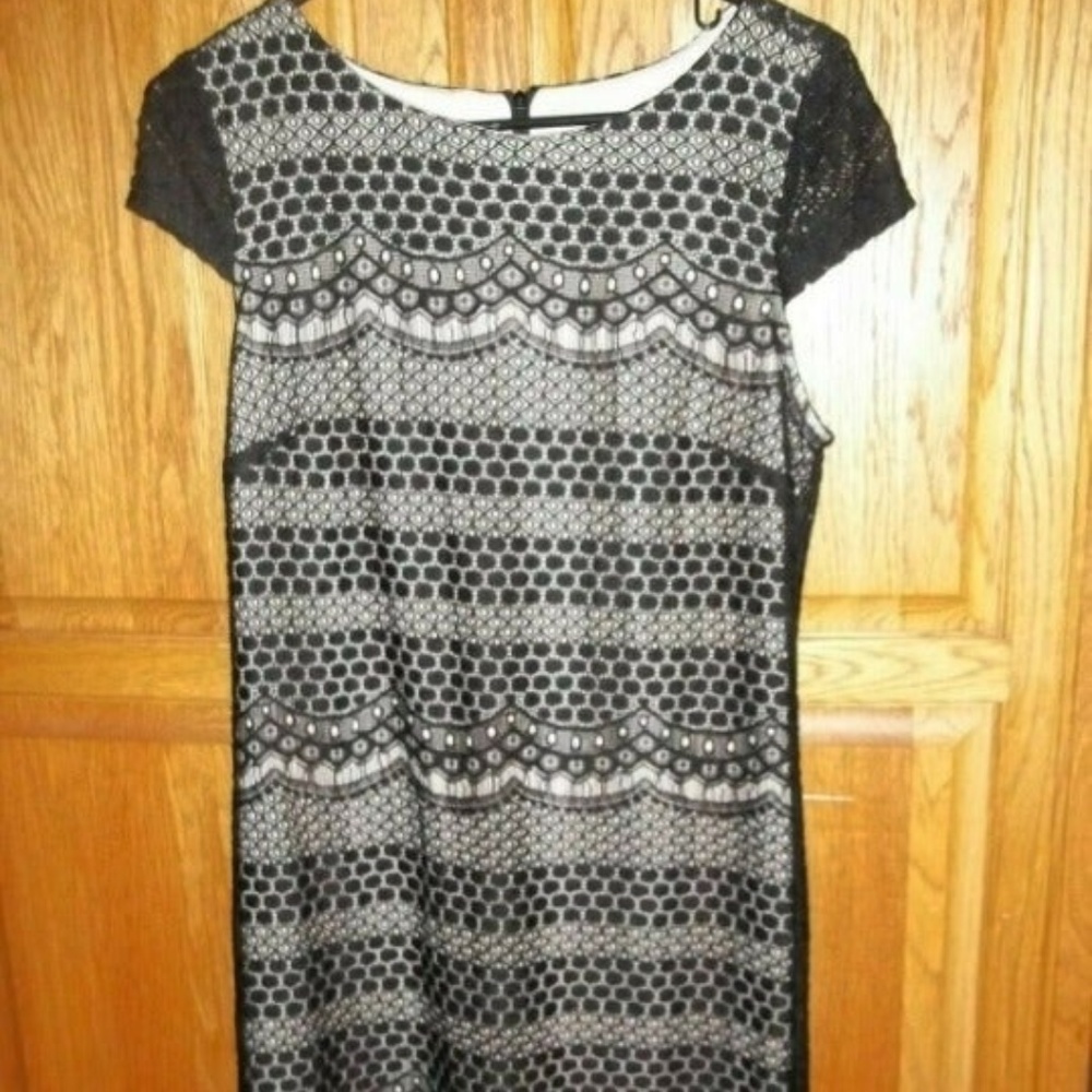 Beautiful black lace lined dress in a size 8